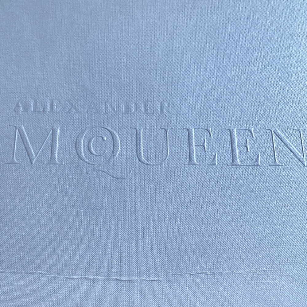 Men’s black platform skull and cross bones sneakers.